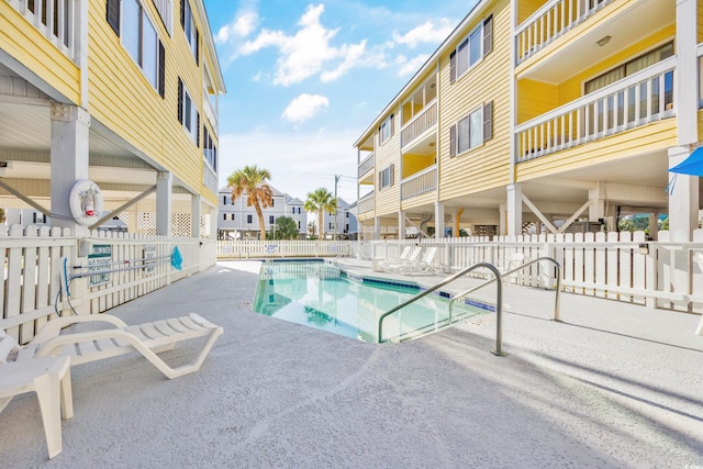 view of pool featuring a patio area