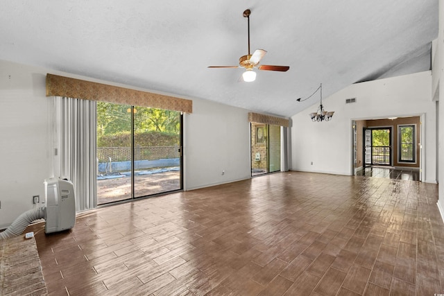 unfurnished living room with visible vents, wood finished floors, high vaulted ceiling, baseboards, and ceiling fan with notable chandelier