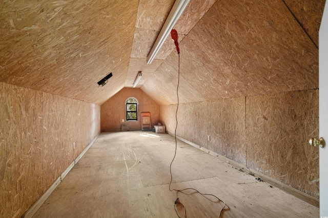 additional living space with lofted ceiling