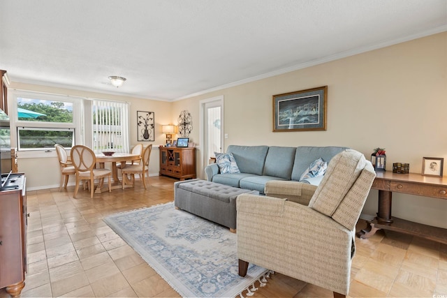 living room featuring crown molding and light tile patterned floors