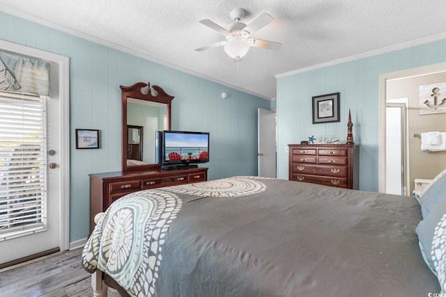 bedroom featuring a textured ceiling, access to exterior, ceiling fan, crown molding, and light hardwood / wood-style flooring