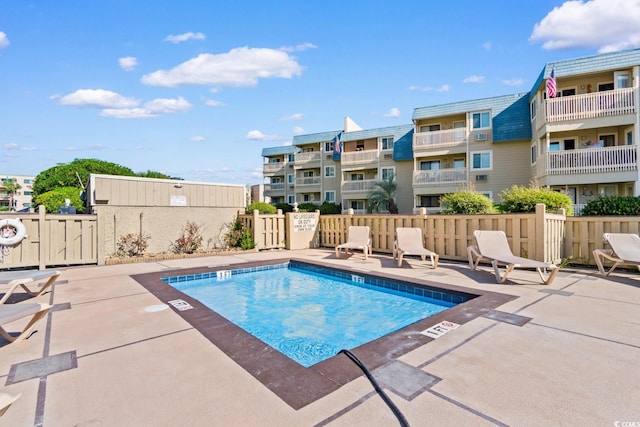 view of pool featuring a patio area