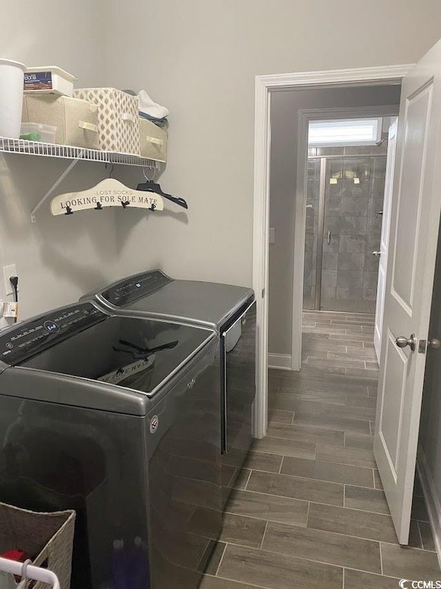 laundry room featuring independent washer and dryer