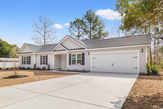 ranch-style home featuring a garage, concrete driveway, and a shingled roof