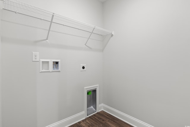 washroom featuring hookup for an electric dryer, laundry area, dark wood-style flooring, washer hookup, and baseboards