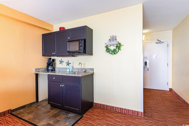 bar featuring sink