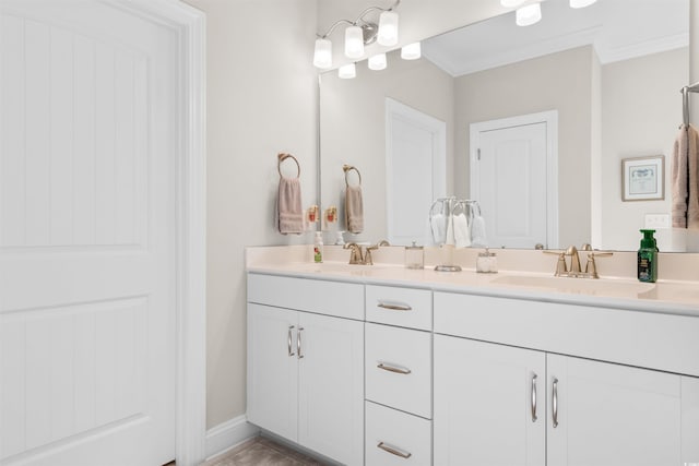 bathroom featuring vanity and crown molding