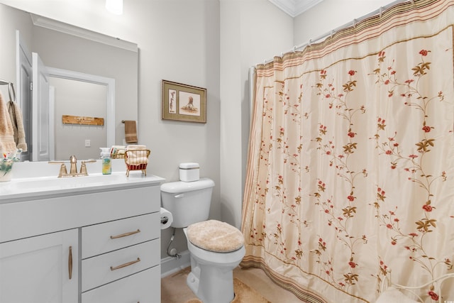 bathroom with crown molding, vanity, toilet, and a shower with shower curtain