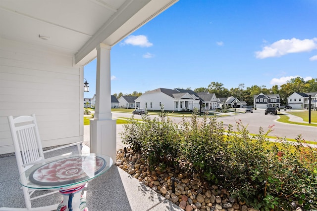 view of patio featuring a porch