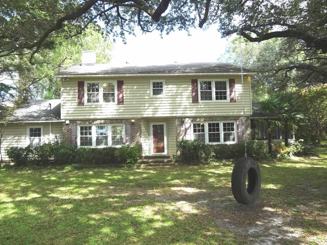 colonial house with a front yard