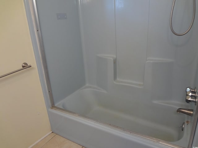 bathroom with shower / bathing tub combination and tile patterned floors