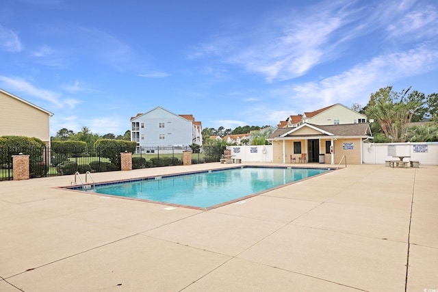 view of pool featuring a patio area