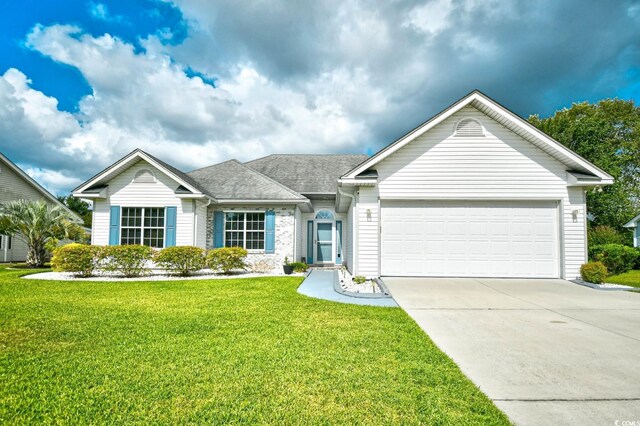 single story home with a garage and a front yard