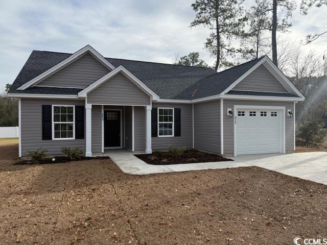 view of front of home featuring a garage