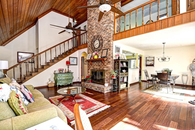 living room featuring a brick fireplace, hardwood / wood-style floors, high vaulted ceiling, and wooden ceiling