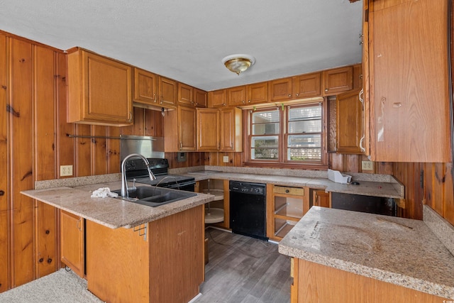 kitchen featuring kitchen peninsula, dishwasher, sink, and wooden walls