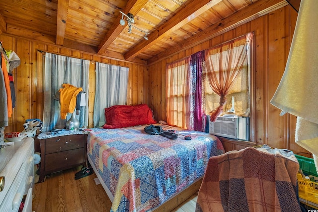 bedroom with cooling unit, wood walls, beam ceiling, wooden ceiling, and light hardwood / wood-style floors