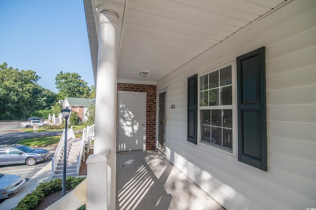 doorway to property featuring a porch