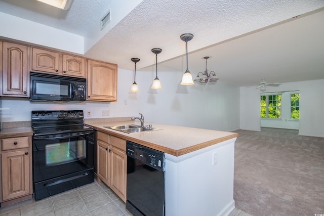 kitchen featuring kitchen peninsula, light colored carpet, sink, black appliances, and pendant lighting