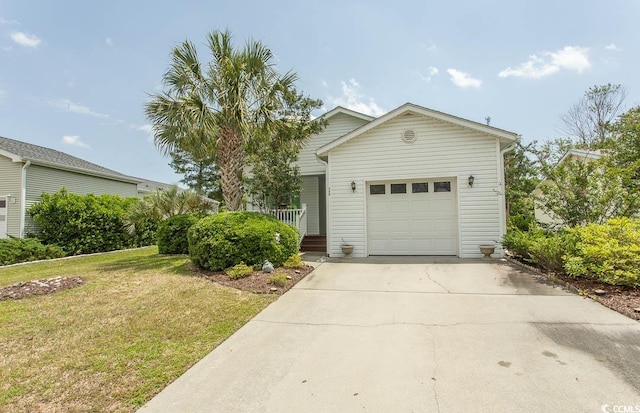 340 Walden Lake Rd, Conway, SC 29526 - view of front of home featuring a garage, a front lawn, and concrete driveway