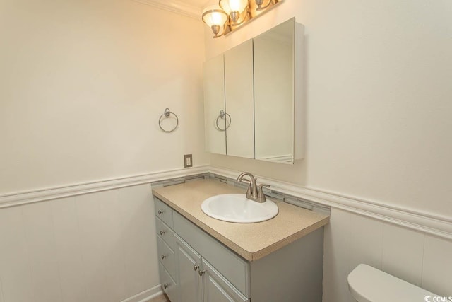 340 Walden Lake Rd, Conway, SC 29526 - bathroom featuring a wainscoted wall, vanity, toilet, and a chandelier