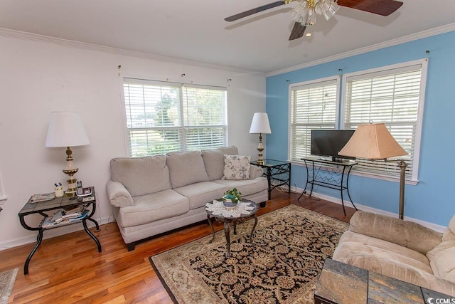 living room with ceiling fan, light hardwood / wood-style flooring, and ornamental molding