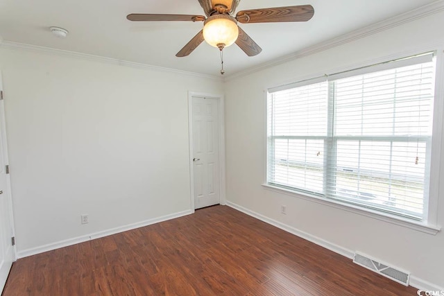 340 Walden Lake Rd, Conway, SC 29526 - unfurnished room with dark wood finished floors, baseboards, ornamental molding, a ceiling fan, and a smoke detector