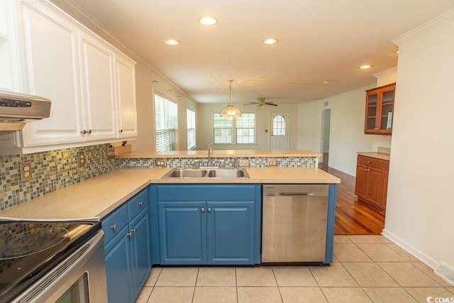 340 Walden Lake Rd, Conway, SC 29526 - kitchen with stainless steel appliances, a sink, a peninsula, recessed lighting, and white cabinets