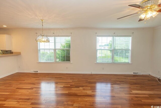 340 Walden Lake Rd, Conway, SC 29526 - empty room with wood finished floors, ornamental molding, baseboards, and ceiling fan