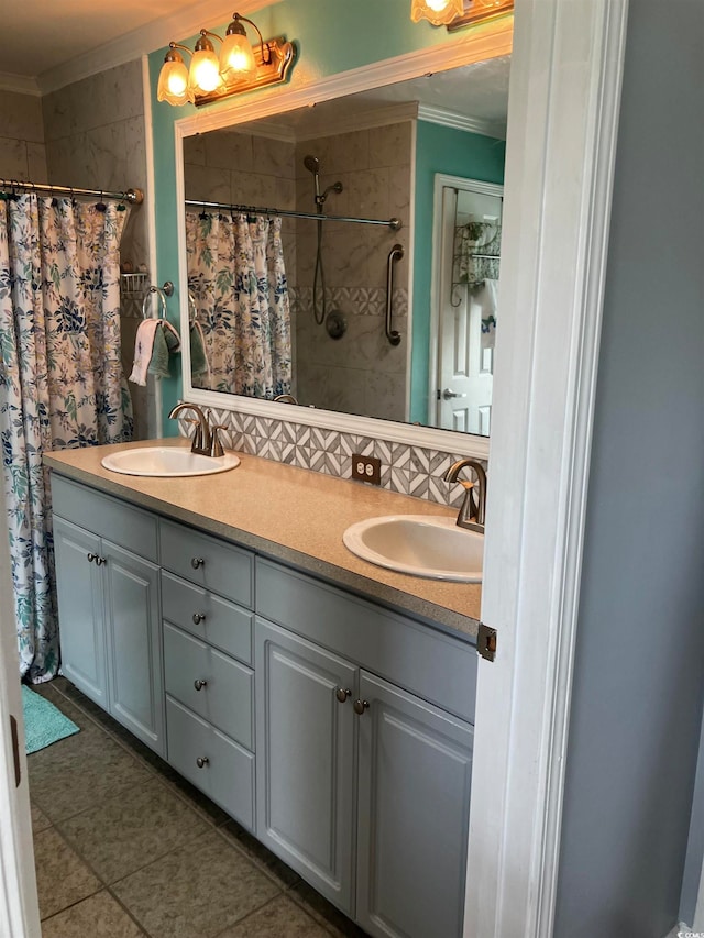 bathroom featuring tile patterned flooring, crown molding, vanity, and a shower with curtain