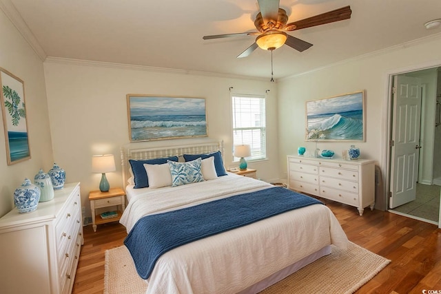340 Walden Lake Rd, Conway, SC 29526 - bedroom with light wood-type flooring, crown molding, a ceiling fan, and baseboards