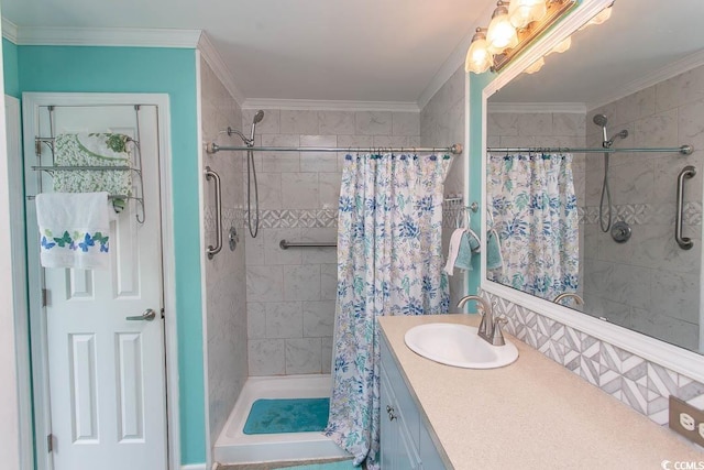 bathroom featuring ornamental molding, vanity, and a shower with curtain