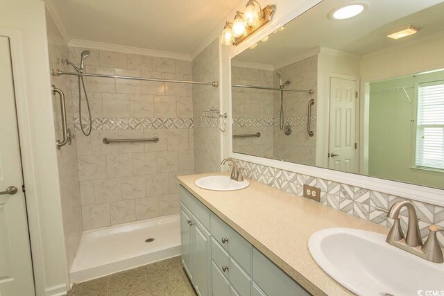 340 Walden Lake Rd, Conway, SC 29526 - full bathroom featuring crown molding, a tile shower, double vanity, and a closet