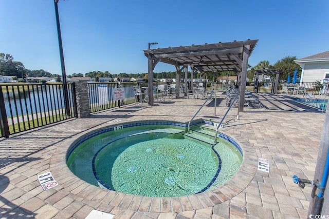 view of pool with a water view, a patio, a community hot tub, and a pergola