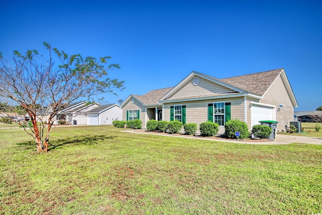 ranch-style home with a front lawn and a garage