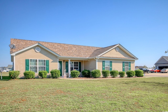 ranch-style home featuring a front yard