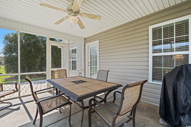 sunroom / solarium with ceiling fan