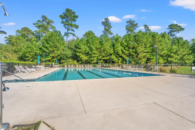 view of pool featuring a patio