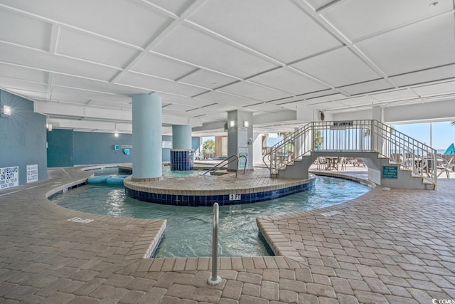 view of pool featuring a patio area