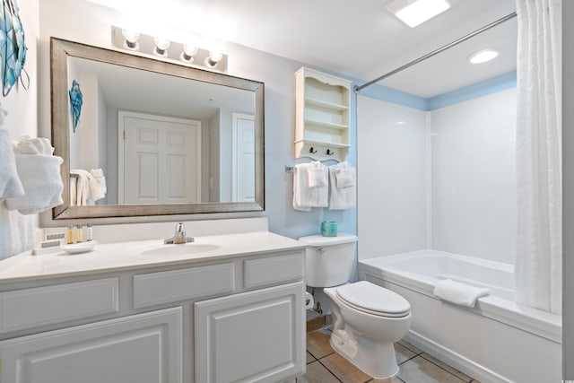 full bathroom with vanity, shower / bath combination with curtain, toilet, and tile patterned floors