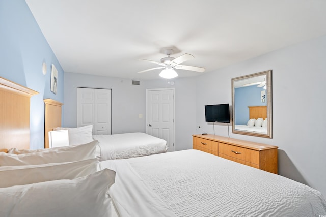 bedroom with a closet and ceiling fan