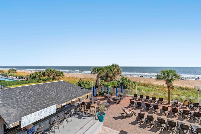 exterior space featuring a beach view