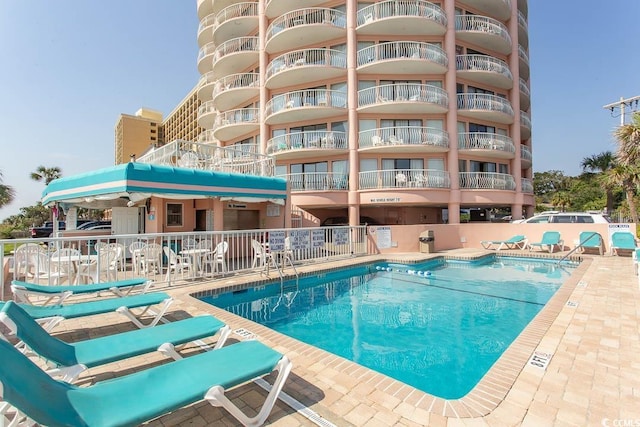 pool featuring a patio