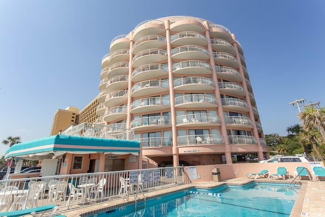 202 70th Ave N Unit 104, Myrtle Beach, SC 29572 - view of apartment building / complex featuring a community pool