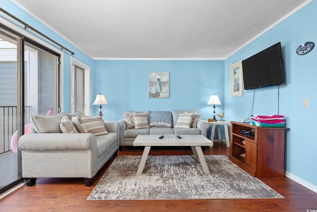 living room with crown molding, a textured ceiling, and dark hardwood / wood-style floors