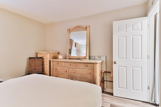 bedroom with light hardwood / wood-style flooring