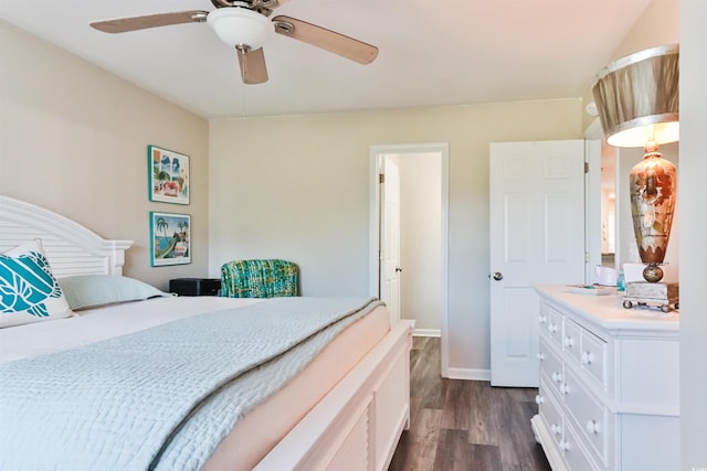 bedroom featuring ceiling fan and dark wood-type flooring