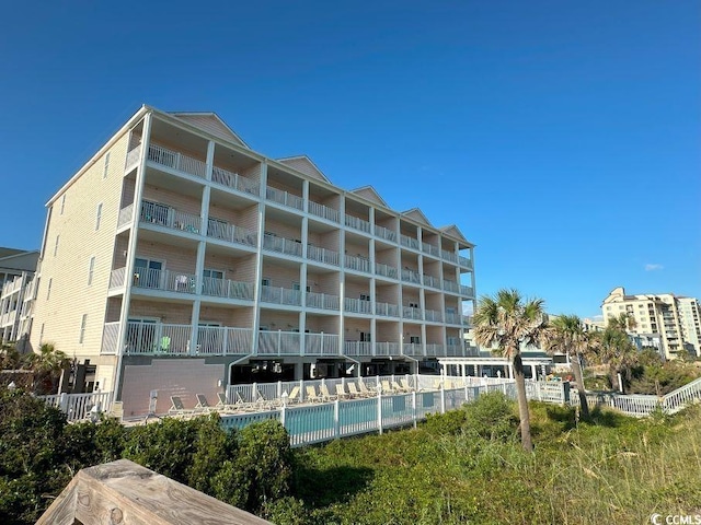 view of property with a community pool