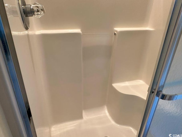 bathroom with a shower