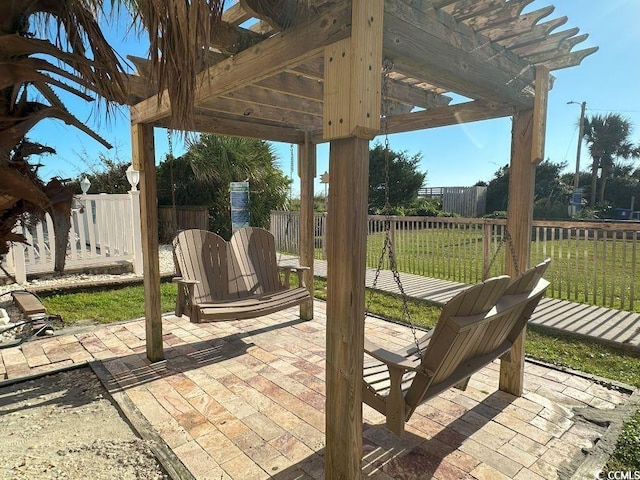 view of patio featuring a pergola